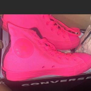 Pink converse. Worn a couple of times.